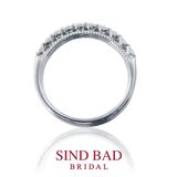 【SIND BAD(シンドバット)】ハーフエタニティ　婚約指輪　サイドから見ると幸せの重なりミル打ちが