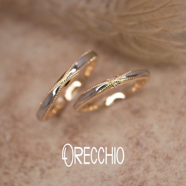【ORECCHIO(オレッキオ)】セグイド～seguido　クロスに走るミルグレインが指元を華やかに演出する結婚指輪