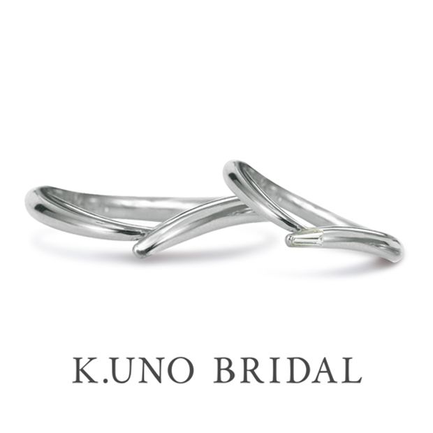 【ケイウノ ブライダル(K.UNO BRIDAL)】【ノイ・ドゥエ】手を取り合うふたりの姿をイメージ。いつまでも一緒に