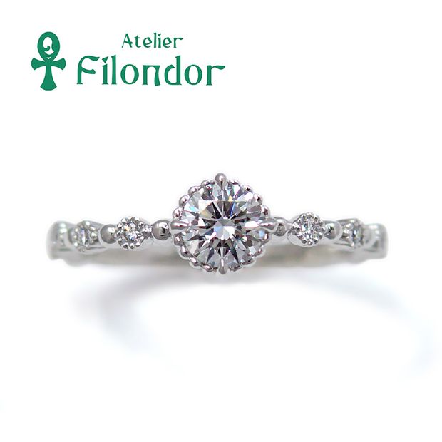 【アトリエフィロンドール】【アトリエ・フィロンドール】ミル玉とミル打ちで繊細にダイヤを包んだ婚約指輪