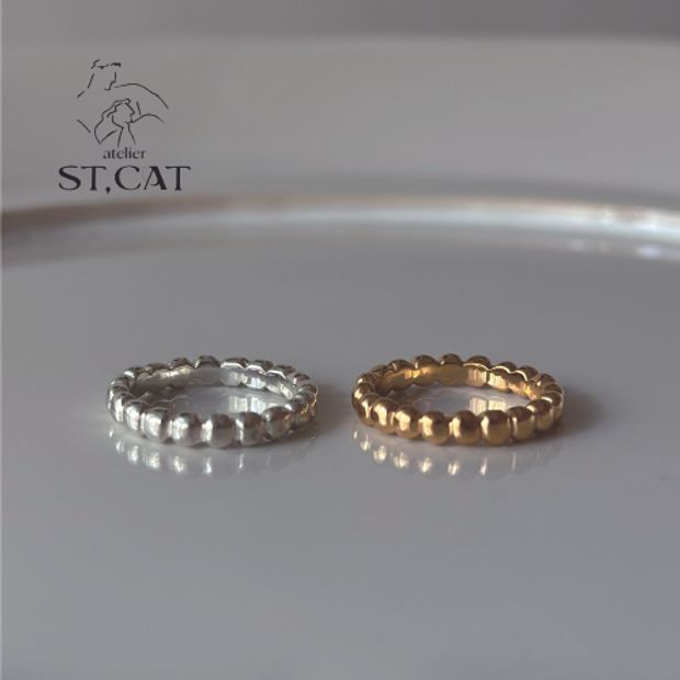 【atelier ST, CAT(アトリエ エスティーキャット)】彫刻作品を思わせる、円が並んだデザイン【オーダー結婚指輪】Arp