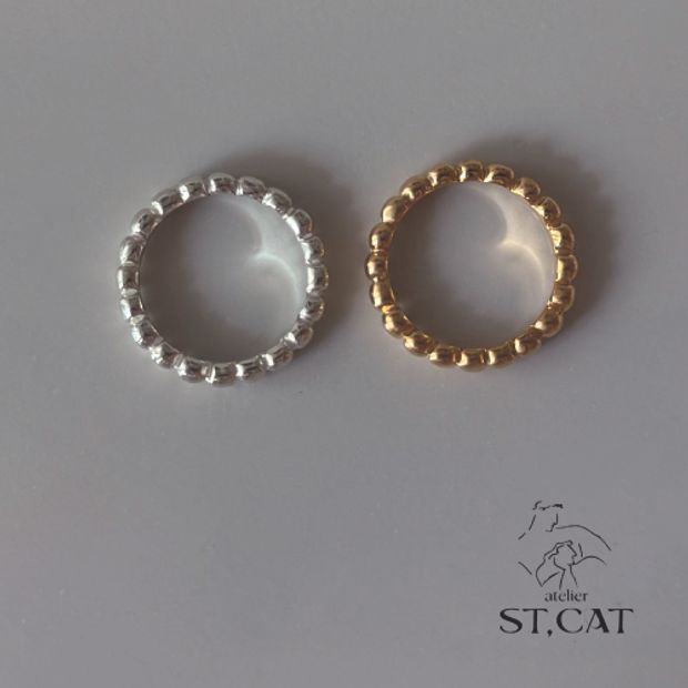 【atelier ST, CAT(アトリエ エスティーキャット)】彫刻作品を思わせる、円が並んだデザイン【オーダー結婚指輪】Arp