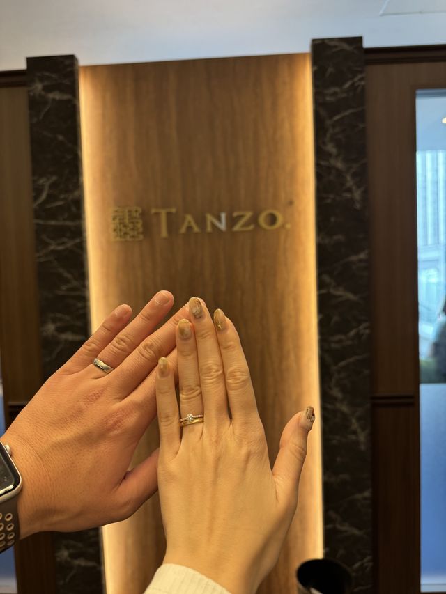 着用後、TANZOのブランドロゴとともに