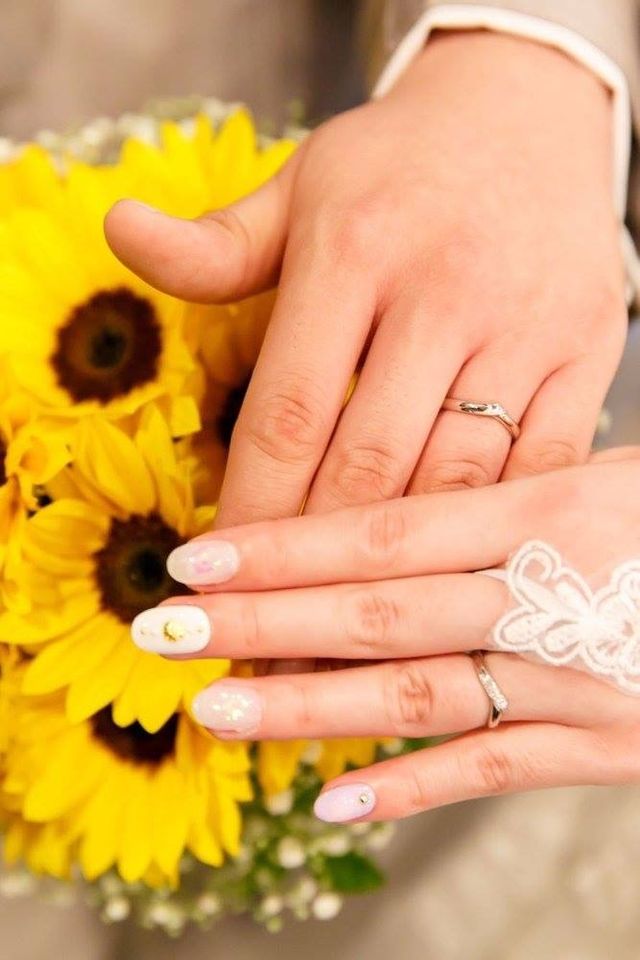 お気に入りの向日葵のブーケと一緒に撮って頂きました。