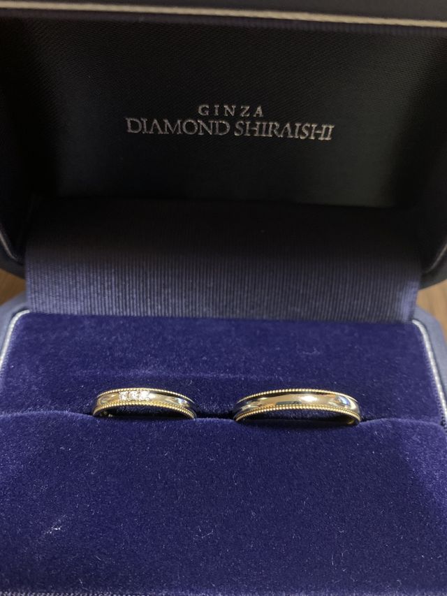 ミルグレインのゴールドとプラチナのコンビ。ダイヤ3石プラス。