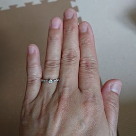 【TAKE-UP(テイクアップ)の口コミ】 この指輪のメインダイヤの横に小さいダイヤが並んでいる豪華なデザインが…