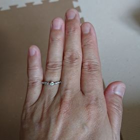 【TAKE-UP(テイクアップ)】の口コミ この指輪のメインダイヤの横に小さいダイヤが並んでいる豪華なデザインが気...