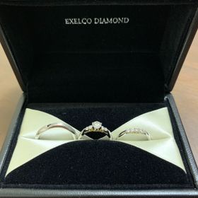 【エクセルコダイヤモンド(EXELCO DIAMOND)の口コミ】 指輪のデザインとても気に入って購入しました。ダイアモンドの下のイエロ…