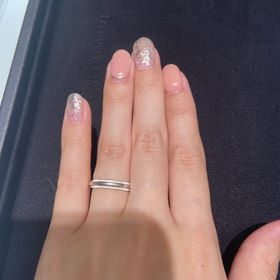 【ティファニー(Tiffany & Co.)の口コミ】 プラチナ素材のミル打ちデザインで、男性と全く同じデザインというところ…