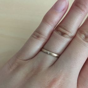 【Joyeux(ジョワイユ)】の口コミ 夫婦共に星モチーフが好きで、この星の台座の指輪を見て、お互いいいね！と...