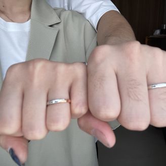 【紡ぎ輪(つむぎわ)】の口コミ プラチナ950で、男女ですこしデザインが違い、重ね合わせると桜の花が浮...