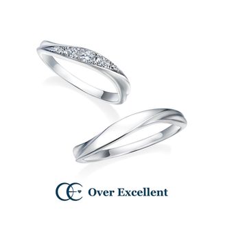【Over Excellent(オーバーエクセレント)】 【Precious ribbon プレシャス・リボン -ふたりの愛-】愛を重ね合わせるリボンのような流れるデザイン。優雅な曲線美が手元を演出。