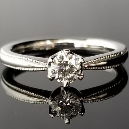 【TANZO.(鍛造指輪)】ミル打ちがクラシックなご婚約指輪