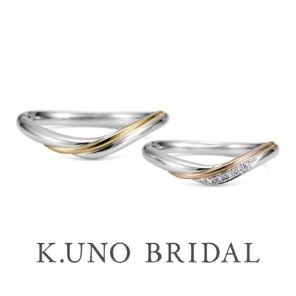 【ケイウノ ブライダル(K.UNO BRIDAL)】【ルミナーレ】指の流れに沿ったゴールドの輝きが、光が射し込む様子を表現。