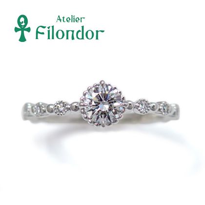 【アトリエフィロンドール】【アトリエ・フィロンドール】ミル玉とミル打ちで繊細にダイヤを包んだ婚約指輪
