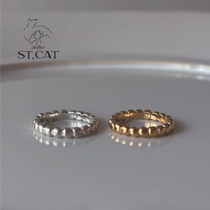 【atelier ST, CAT(アトリエ エスティーキャット)】彫刻作品を思わせる、円が並んだデザイン【オーダー結婚指輪】Arp