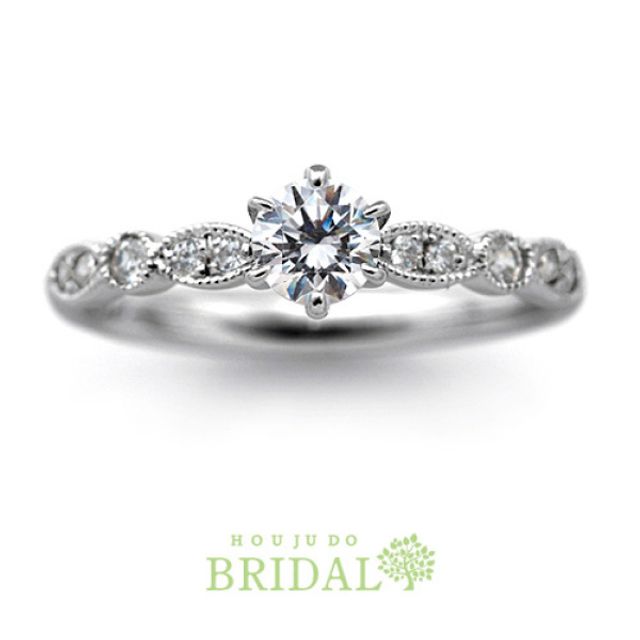 【宝寿堂】特徴的なミル遣いが目を惹く華やかなエンゲージリング《HD2696》